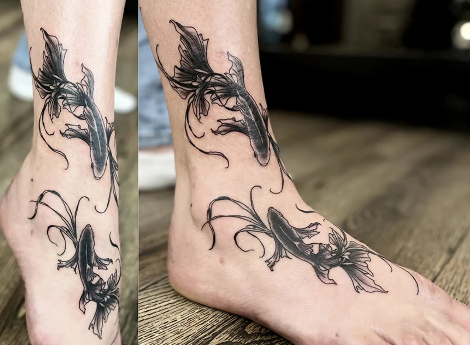 Elegant black-and-grey tattoos of two long-finned koi fish swimming along the ankle and top of the foot, utilizing flowing lines to mimic movement.